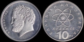 GREECE: 10 Drachmas (1992) (type Ia) in copper-nickel with atom at center and inscription "ΕΛΛΗΝΙΚΗ ΔΗΜΟΚΡΑΤΙΑ". Head of Democritos facing left on rev...