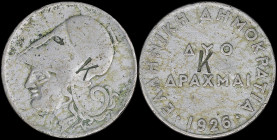 GREECE: Private token in copper-nickel. "K" struck on both sides of 2 drx (1926) (Hellas 175). Diameter: 27mm. Weight: 6,43gr. Fine.