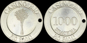 GREECE: Holed brass or bronze token of the Casino in Rio. Cobs tied together on obverse. The value "1000 Drachmas" on reverse. Coin alignment. Diamete...