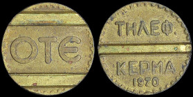 GREECE: Bronze or brass token. Inscription "OΤE" on obverse. Inscription "ΤΗΛΕΦ. ΚΕΡΜΑ 1970" on reverse. Diameter: 19mm. Weight: 3,7gr. Extra Fine....