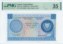 GREECE: 5 Pounds (1.9.1967) in blue on multicolor unpt with Arms at right. S/N: "C/23 931808". WMK: Eagle head. Printed by (BWC). Inside holder by PMG...
