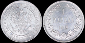 FINLAND: 1 Markka (1915 S) in silver (0,868) with crowned imperial double-headed eagle holding orb and scepter. Denomination and date within wreath on...