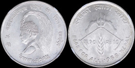 NEPAL: 10 Rupee (1968) in silver (0,600) from F.A.O series with bust of Mahendra Bir Bikram facing left. Trident and 1/2 cogwheel abovbe grain sprig. ...