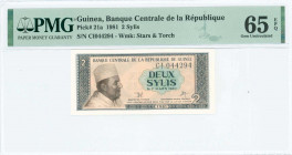 GUINEA: 2 Sylis (1981) in black and brown on orange unpt with King Mohammed V at right. S/N: "CI 044294". WMK: Stars and torch. Inside holder by PMG "...