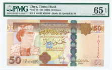 LIBYA: 50 Dinars (ND 2008) in brown and tan on multicolor unpt with Muammar Qaddafi at left. S/N: "1 KH/23 076580". WMK: Qaddafi and value "50". Print...