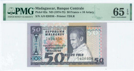 MADAGASCAR: 50 Francs = 10 Ariary (ND 1974-75) in purple on multicolor unpt with young man at center right. S/N: "A/8 620356". WMK: Zebu head. Printed...