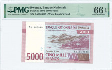 RWANDA: 5000 Francs (1.12.1994) in dark brown, violet and purple on multicolor unpt with mountainous landscape at center right. S/N: "AA 1203845". WMK...