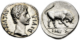 Augustus. Denario. 15-13 BC. Lugdunum. (Ric-167a). (Seaby-137). Anv.: AVGVSTVS DIVI F. Bare head right. Rev.: IMP X. Bull charging right. Ag. 3,86 g. ...