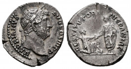 Hadrian. Denarius. 130-133 AD. Rome. (Ric-II 3.1580). (Bmcre-889). (Rsc-1270). Anv.: HADRIANVS AVG COS III P P, laureate bust right. Rev.: RESTITVTORI...