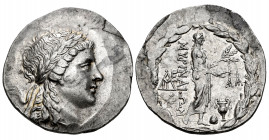 Aeolis. Myrina. Tetradrachm. 160-143 BC. Stephanophoric type. (Sacks-34). (Hunterian-5). Anv.: Laureate head of Apollo right. Rev.: Apollo Grynios sta...