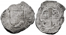 Philip III (1598-1621). 8 reales. 1599. Sevilla. B. (Cal-953). Ag. 27,17 g. OMNIVM type. Circular frames on obverse and reverse. Visible data. Rare, e...