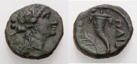 Lukanien. 
Poseidonia. 
Als Paestum, 280-1 v. Chr. Triens, Bronze, 218-201 v. Chr. Weibl. Kopf mit Efeukranz n. r., dahinter Wertkugeln (zwei erkenn...
