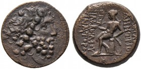 Syria. Königreich der Seleukiden. 
Demetrios II., 1. Regierung 145-141 v. Chr. AE-23 mm -Antiochia-. Belorbeerte Büste nach rechts / Apollo auf Ompha...