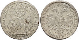 Nürnberg, Stadt. 
Taler 1635 von Georg Nürnberger d.Ä. Nach rechts blickender, geflügelter Genius mit Lorbeer- und Palmzweig zwischen den drei Wappen...