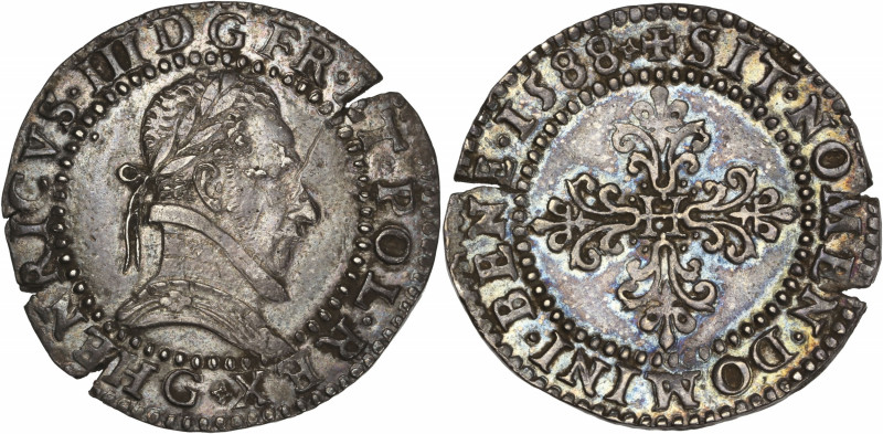 Henri III - 1/2 franc au col plat 1588 G (Poitiers) 

Argent - 7,02 grs - 30 mm
...