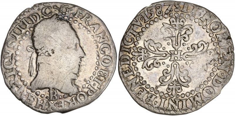 Henri III - 1/4 franc au col plat 1587 B (Rouen) 

Argent - 3,43 grs - 22 mm
Sb....