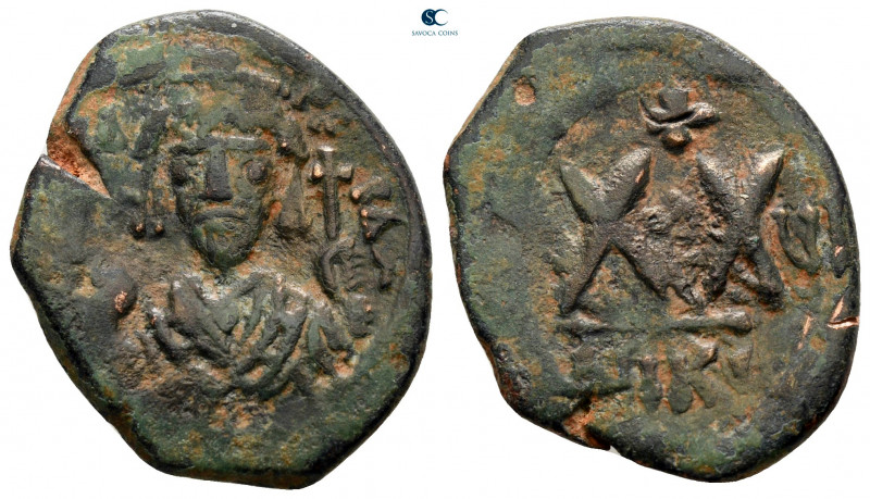 Phocas AD 602-610. Nikomedia
Half Follis or 20 Nummi Æ

23 mm, 5,16 g



...