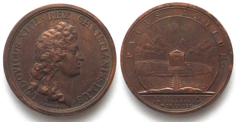 1659. TRAITÉ DE PAIX DES PYRÉNÉES.
AE Medaille par Jean Mauger (1648-1722). 41m...