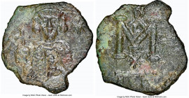 Justinian II, First Reign (AD 685-695). AE follis (20mm, 4.00 gm, 5h). NGC AU 5/5 - 3/5. Syracuse. Justinian II, bearded, standing facing, wearing cro...