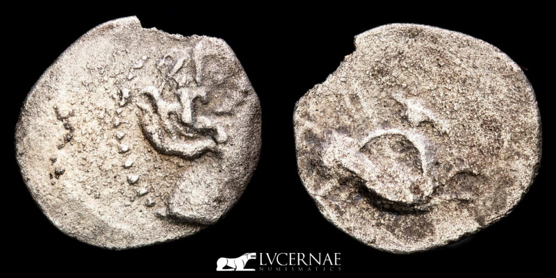 Hispania Antígua - Emporiton. Silver tritartemorion (0,39 g., 11 mm.) minted by ...