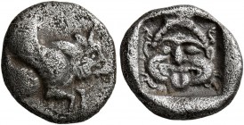 CARIA. Uncertain. 5th century BC. Trihemiobol (?) (Silver, 13 mm, 1.32 g, 11 h). Forepart of a winged bull to right. Rev. Gorgoneion with protruding t...