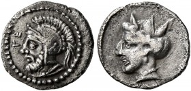 CILICIA. Tarsos. 4th century BC. Obol (Silver, 10 mm, 0.67 g, 12 h). TE Bearded head of Ares (?) to left, wearing crested Attic helmet. Rev. Female he...