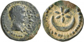 ASIA MINOR. Uncertain. Augustus , 27 BC-AD 14. AE (Bronze, 15 mm, 2.51 g). CAESAR Bare head of Augustus to right. Rev. Star and crescent within dotted...