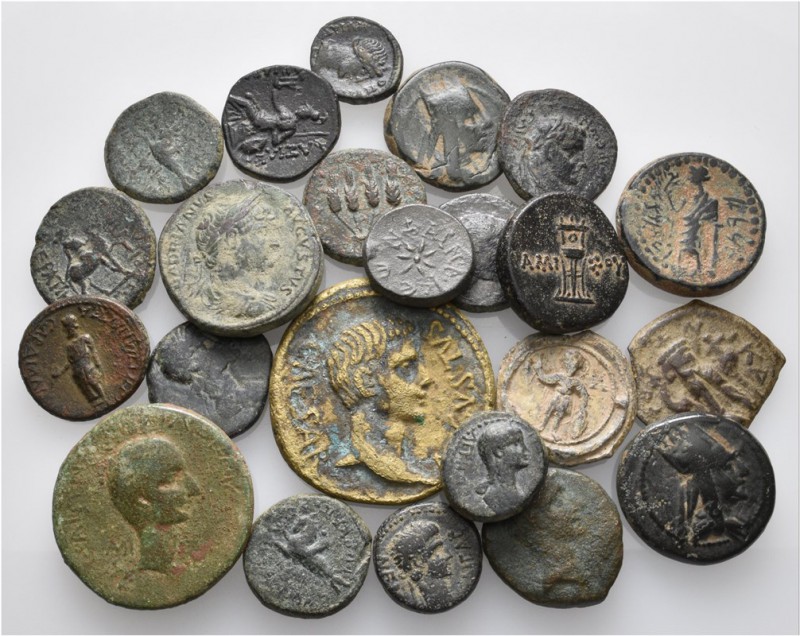 A lot containing 22 bronze coins and 1 lead seal. Includes: Greek, Roman Provinc...