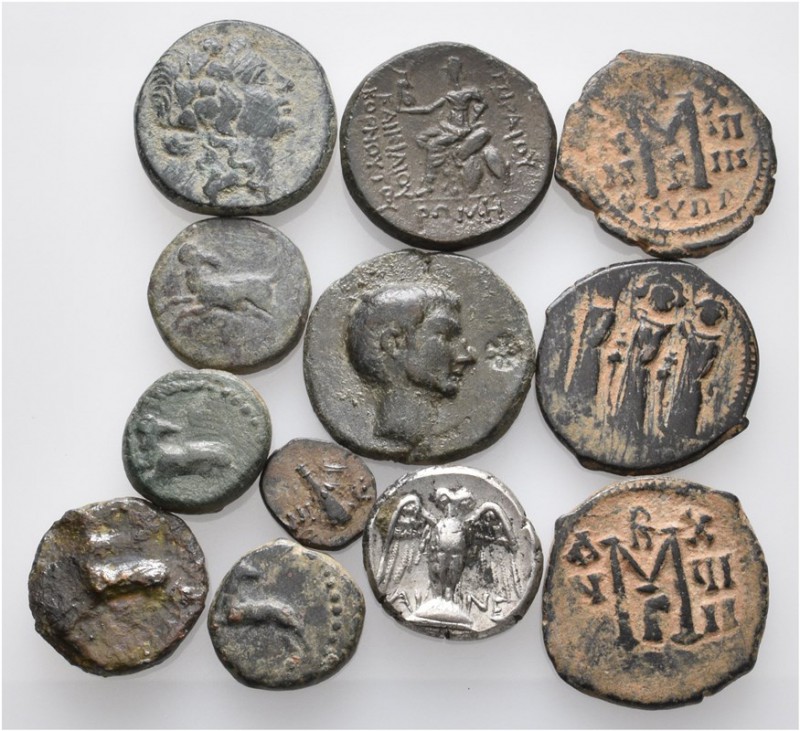 A lot containing 1 silver and 11 bronze coins. Includes: Greek, Roman Provincial...