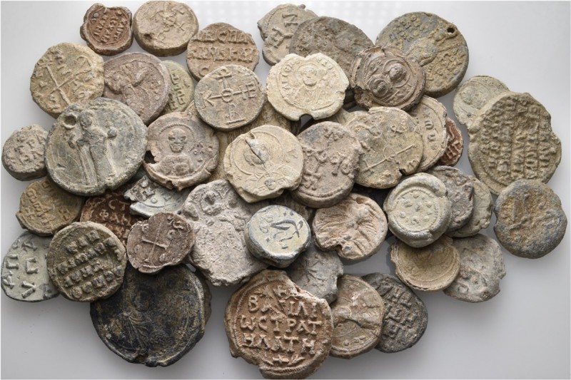 A lot containing 56 Byzantine lead seals. Fine to good very fine. LOT SOLD AS IS...