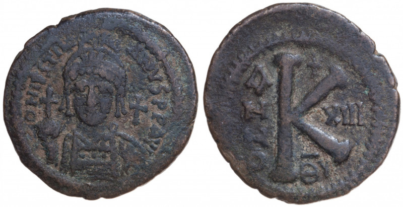 Byzantine. Justinian I. Half Follis Æ circa 527-565 AD, Antioch.
Obv. D N IVSTIN...