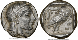 ATTICA. Athens. Ca. 465-455 BC. AR tetradrachm (24mm, 17.15 gm, 1h). NGC XF 5/5 - 2/5, edge cut. Head of Athena right, wearing crested Attic helmet or...