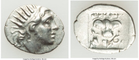 CARIAN ISLANDS. Rhodes. Ca. 88-84 BC. AR drachm (17mm, 2.32 gm, 12h). Choice VF. Plinthophoric standard, Nicephorus, magistrate. Radiate head of Helio...