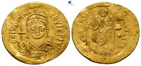 Justinian I. AD 527-565. Constantinople. 2nd officina.. Solidus AV