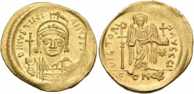 Justinian I, 527-565. Solidus (Gold, 21.5 mm, 4.49 g, 7 h), Constantinople, I = 10th officina, 545-565. D N IVSTINI - ANVS P P AVG Helmeted and cuiras...