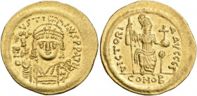 Justin II, 565-578. Solidus (Gold, 21 mm, 4.50 g, 6 h), Constantinople, Γ = 3rd officina, 567-578. D N I-VSTI-NVS PP AVI Diademed, helmeted and cuiras...