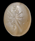 A late Babylonian chalcedony stamp seal.