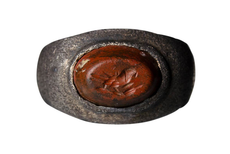 A roman silver ring with red jasper intaglio. Parrot. 

2nd - 3rd century A.D....