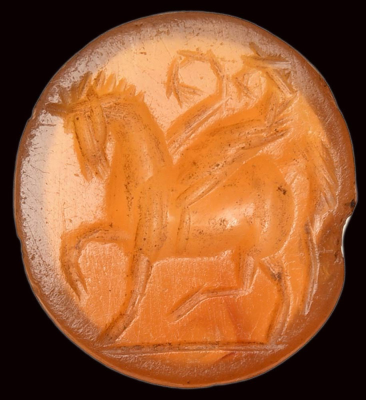 A roman carnelian intaglio. Pegasus. 

2nd century A.D.
9x10,5x2 mm

The wi...