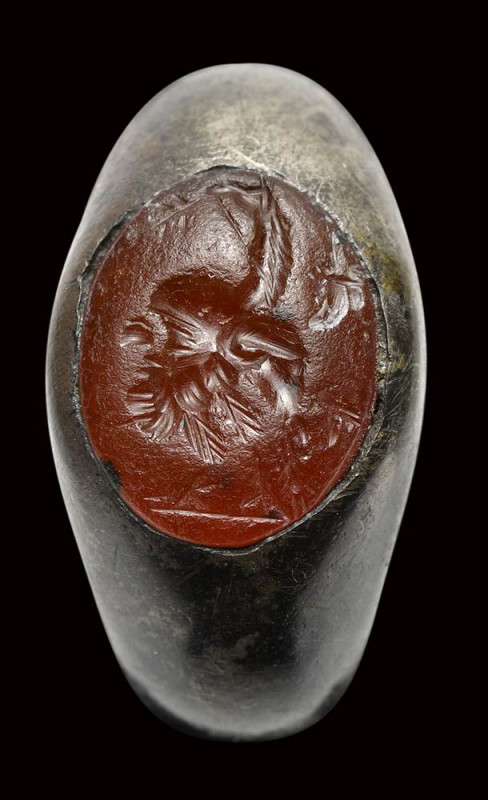 A roman carnelian intaglio mounted on a silver ring. Gryllos. 

2nd - 3rd cent...