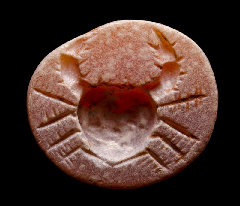 A roman burnt carnelian intaglio. Crab.

2nd century A.D.
10x12x3 mm

The m...