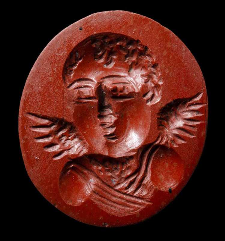 A late roman red jasper intaglio. Eros. 

2nd - 3rd century A.D.
13x14x4 mm
...