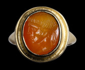 A late republican carnelian intaglio mounted on a modern gold ring. Greek athlete.