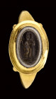 A roman three-layers agate intaglio mounted in a modern gold ring. Harpocrates.