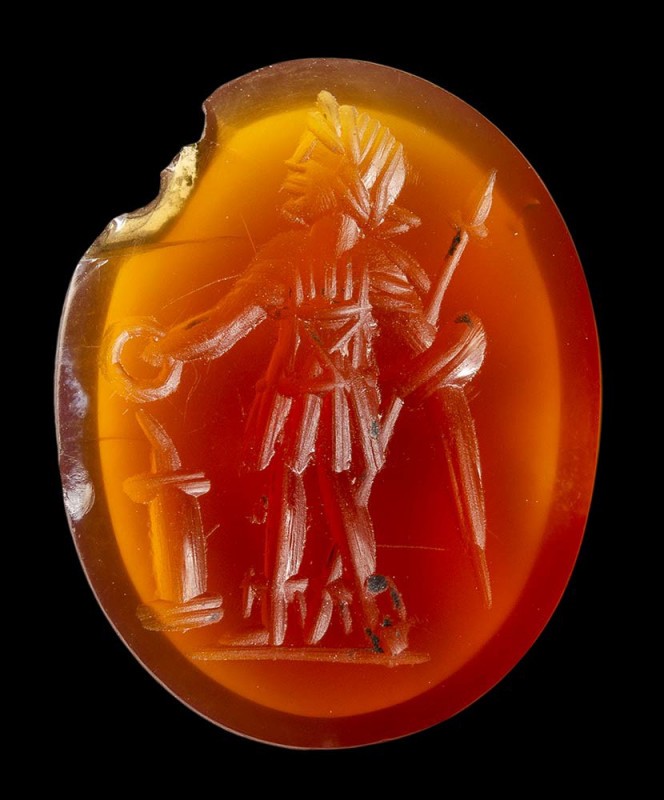 A roman carnelian intaglio. Military votive scene. 

2nd century A.D.
14x17x3...