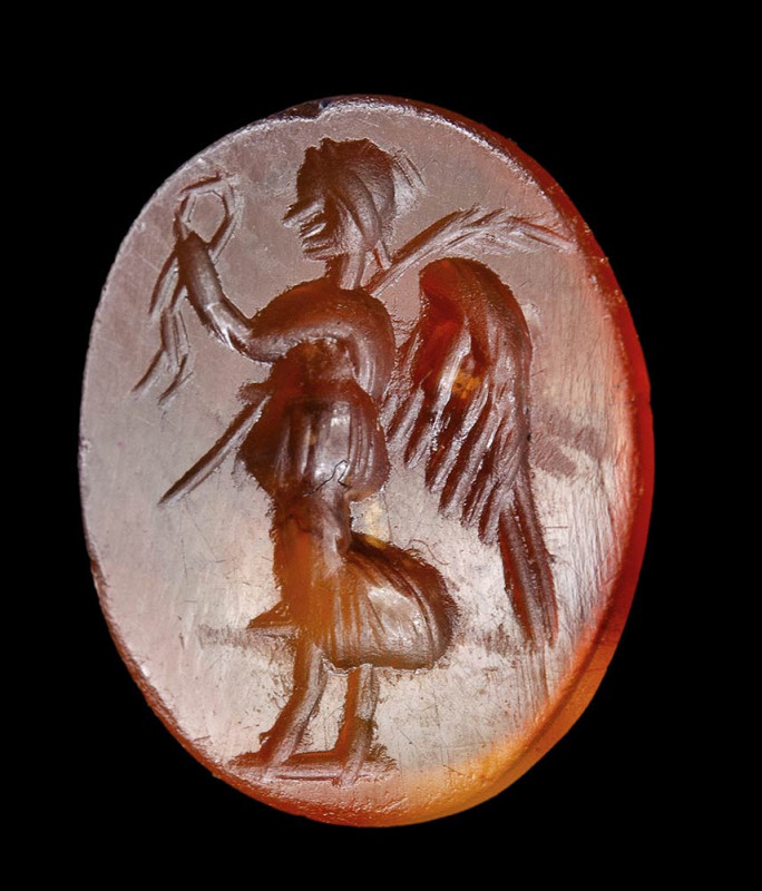 A roman agate carnelian intaglio. Winged Victory. 

2nd century A.D.
8x10x3 m...