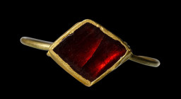 A merovingian gold ring with a garnet.