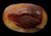 A late roman two-layered agate cameo. Dextrarum Junctio.