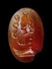 A roman magical carnelian intaglio. Serapis with foot and snake.