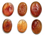 A group of 6 postclassical carnelian intaglios. Heroic and divinities figures.